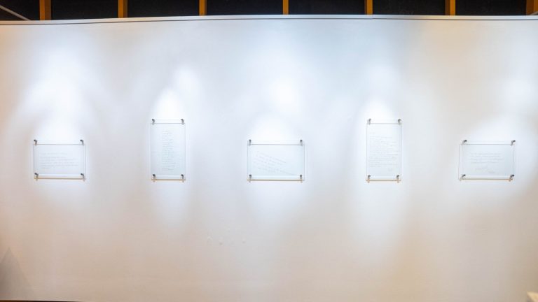 Voices from Aruba Voices from Aruba installation with engraved glass plates and their projected shadows at the National Archaeological Museum Aruba.